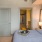 Bedroom with high ceilings